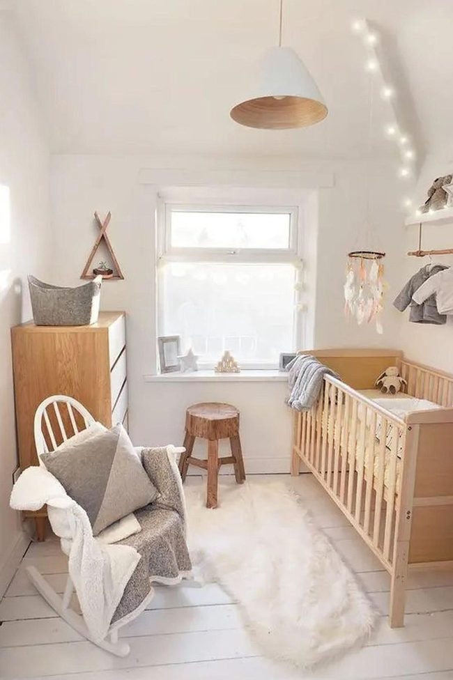 Wooden Crib By Sunlit Window