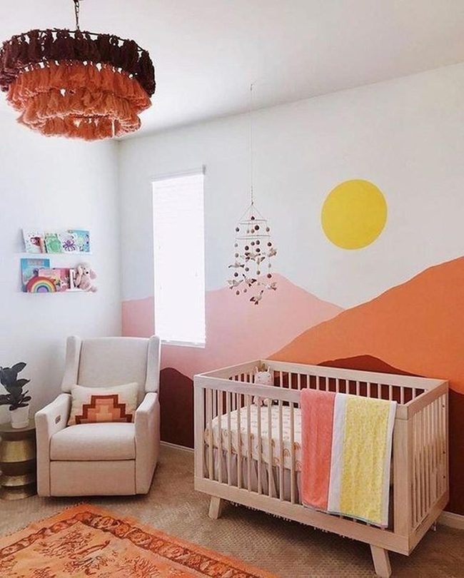 Warm Orange Nursery With Wooden Cribs