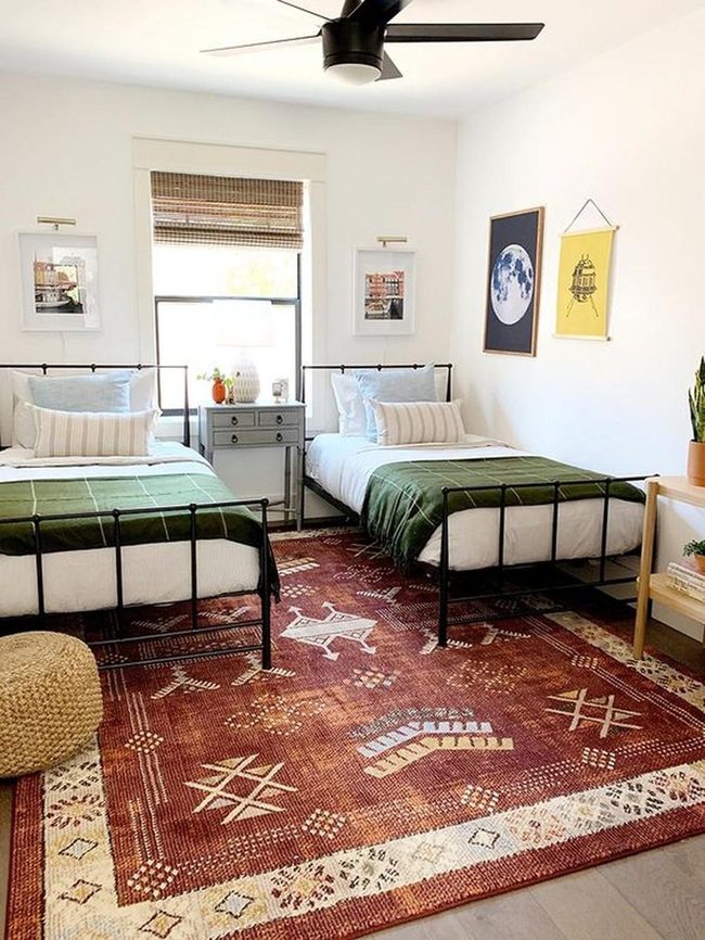 Red Rug Anchors Serene Bedroom