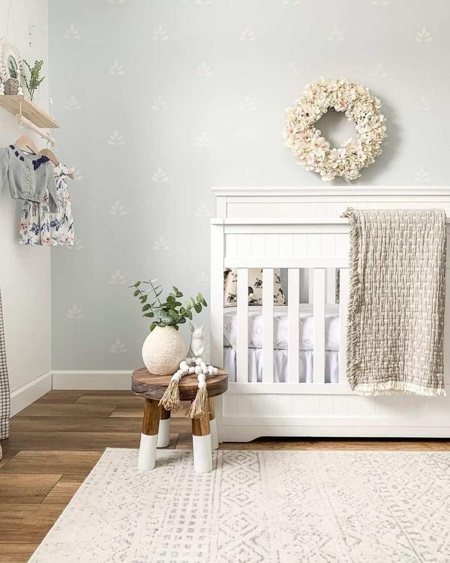 Blue-Gray Nursery With Leaf Patterns