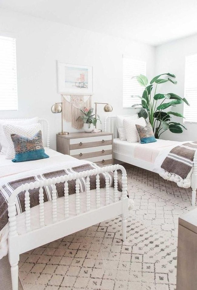 Twin Carved Beds With Natural Light