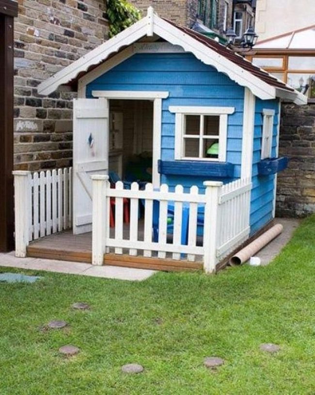 Blue Cottage, White Picket Dreams