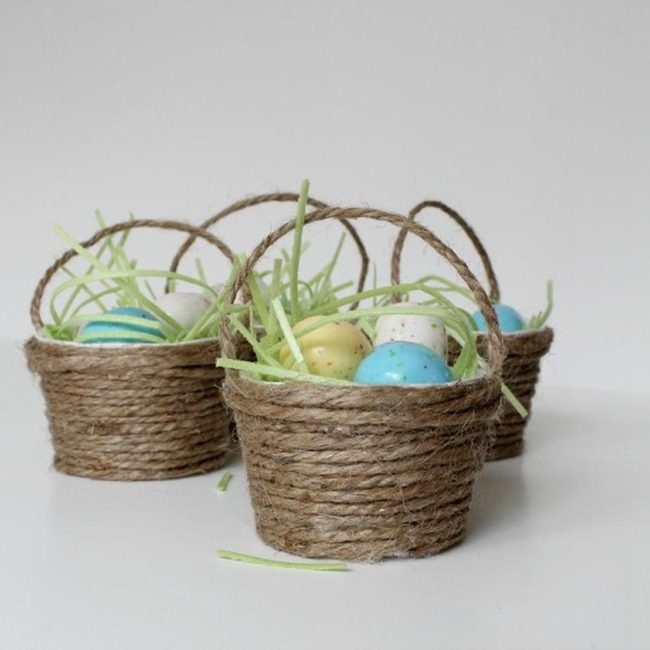 Pastel Eggs In Natural Baskets