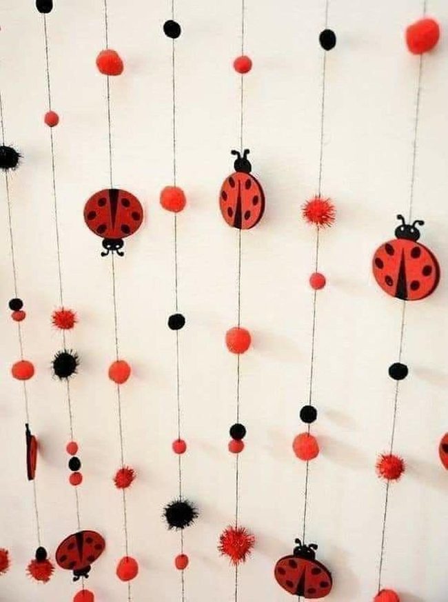 Red And Black Ladybugs Suspended