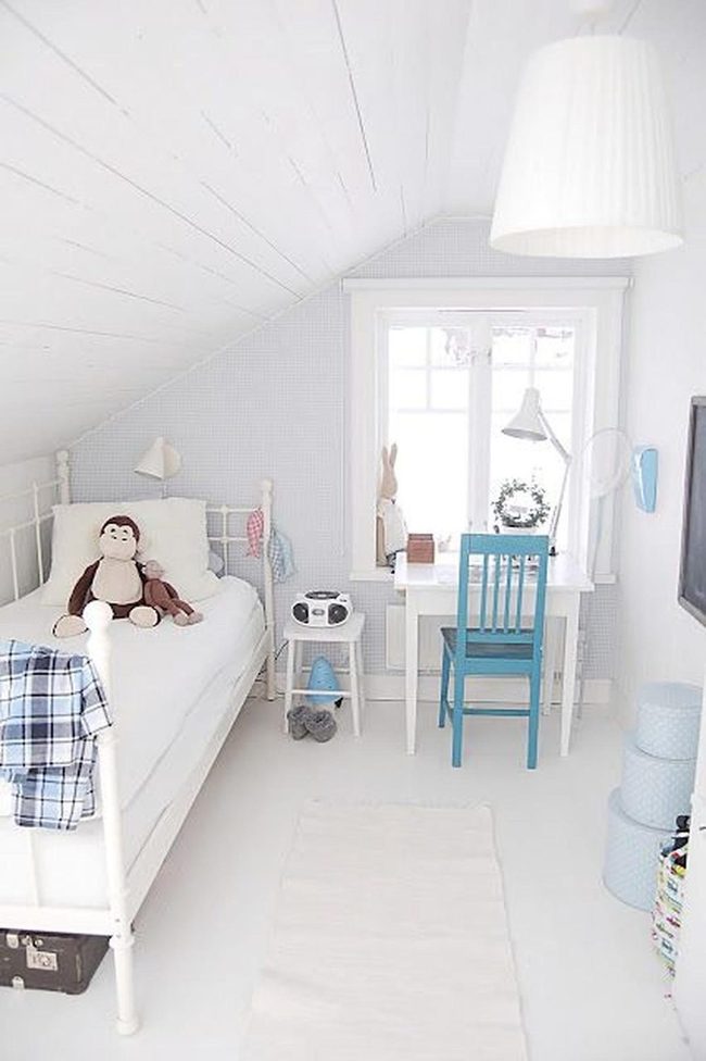 Blue Accents In White Attic Bedroom