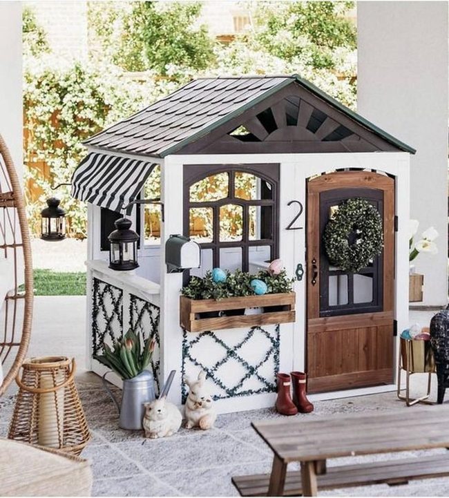 Wooden Playhouse With Black Lanterns
