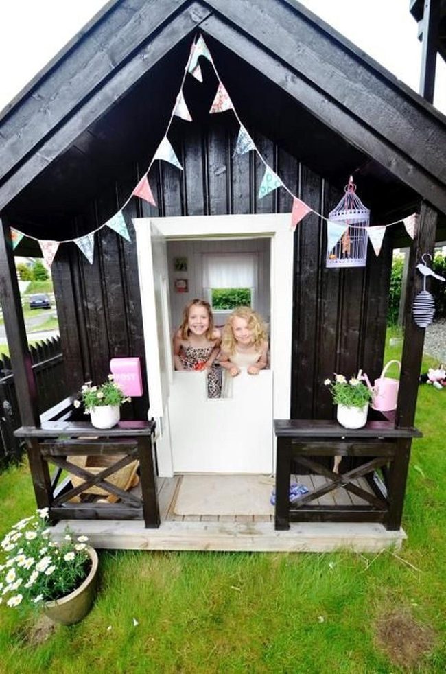 Black Playhouse, White Doors, Green Garden