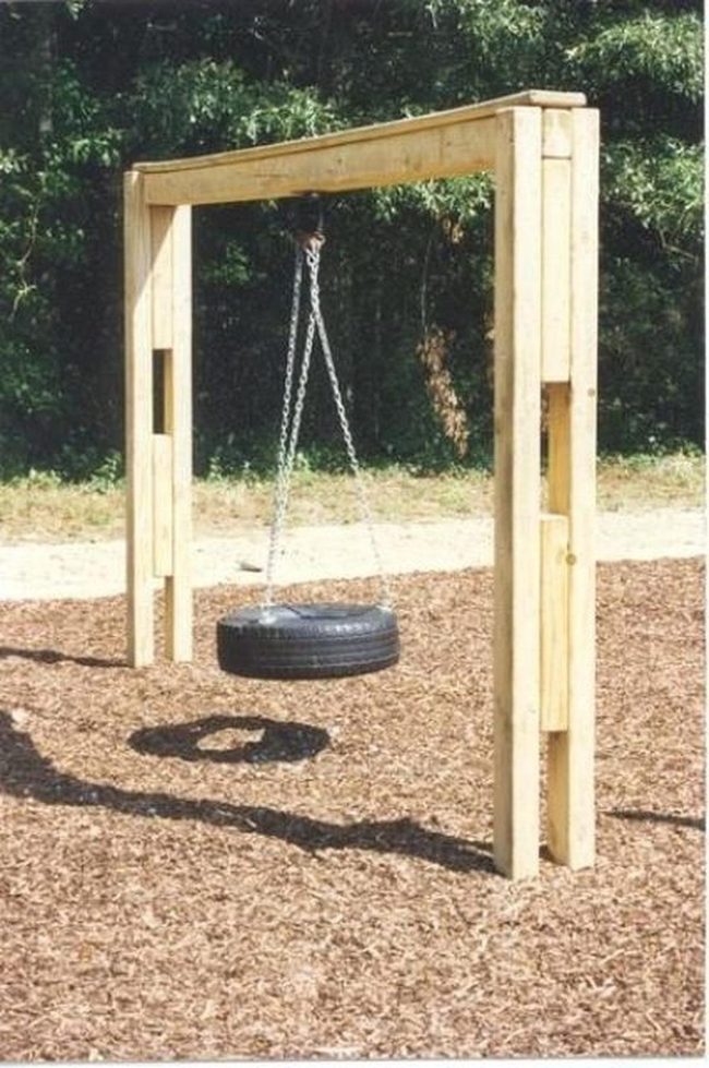 Tire Swings Under Green Canopy