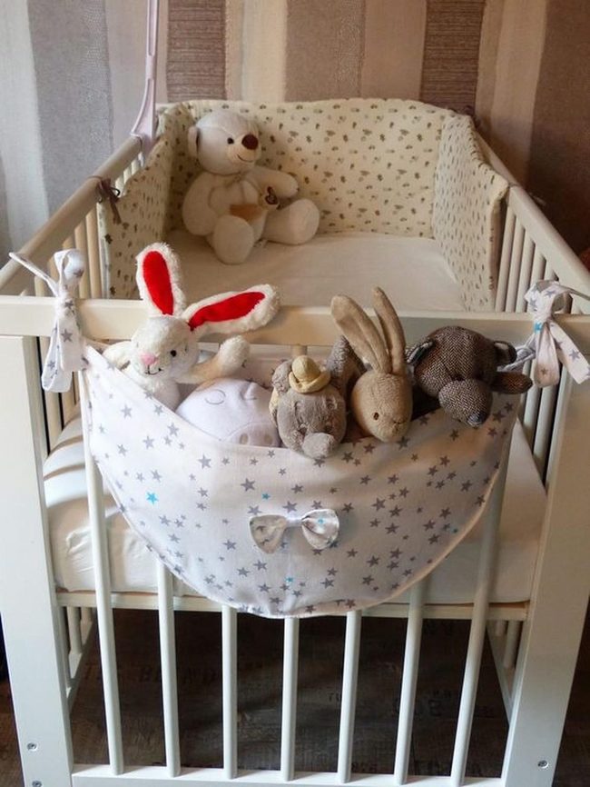 White Cribs, Striped Walls, Stuffed Animals