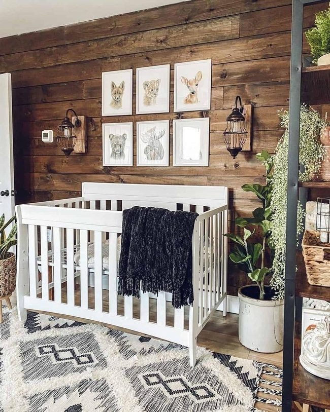 Dark Wood Nursery With Animal Prints