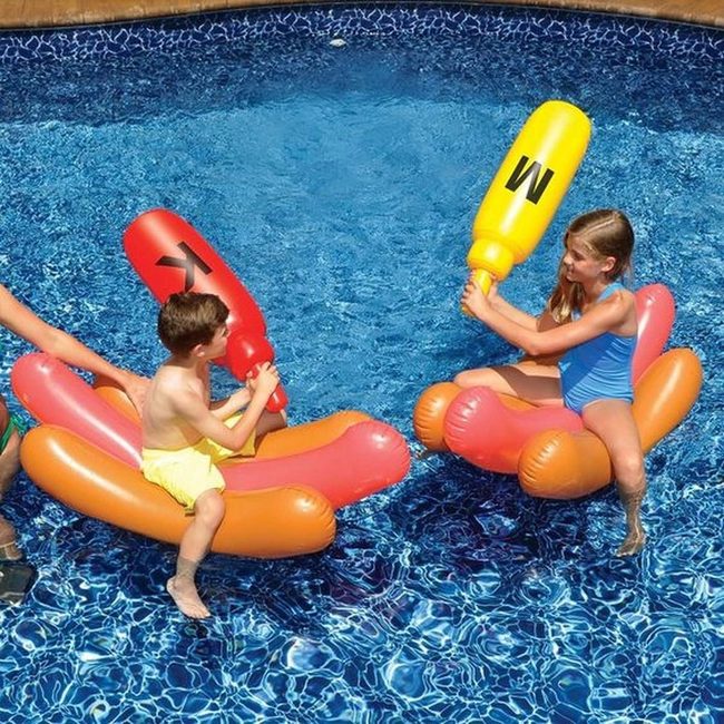 Splashing Kids In Neon Floats