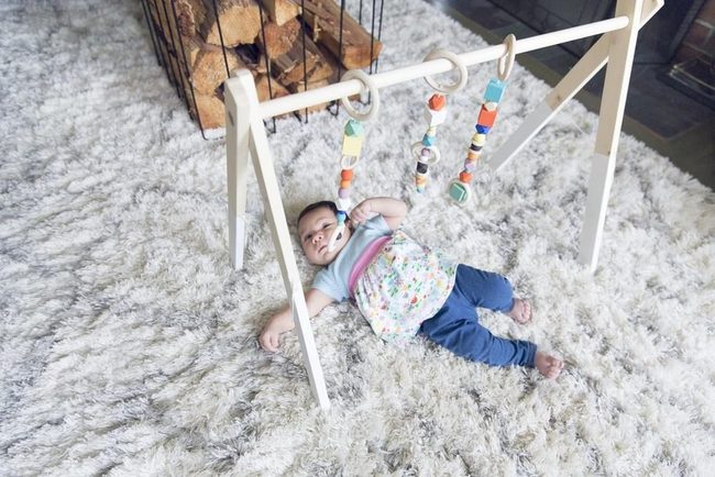 Soft White Nursery With Wood