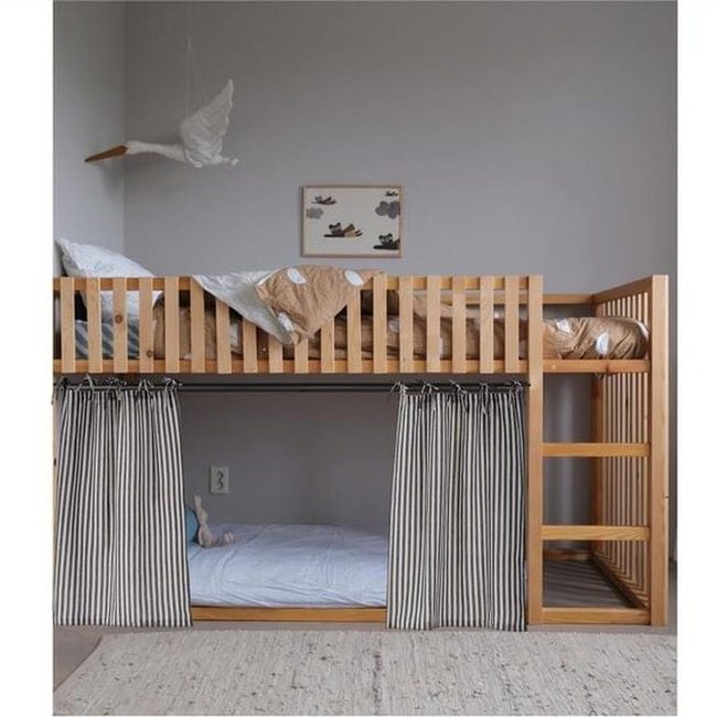 Black Striped Curtains Over Wooden Slats