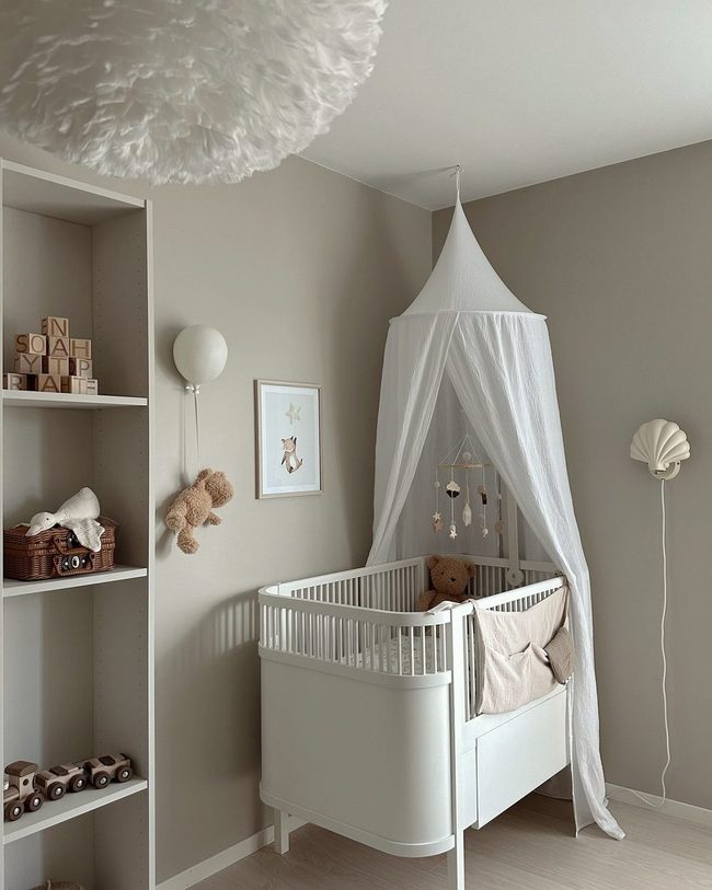Canopy Crib With Neutral Tones