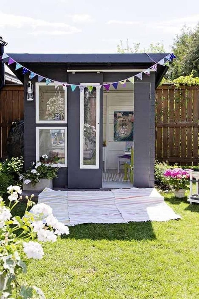 Gray Shed With White Trim