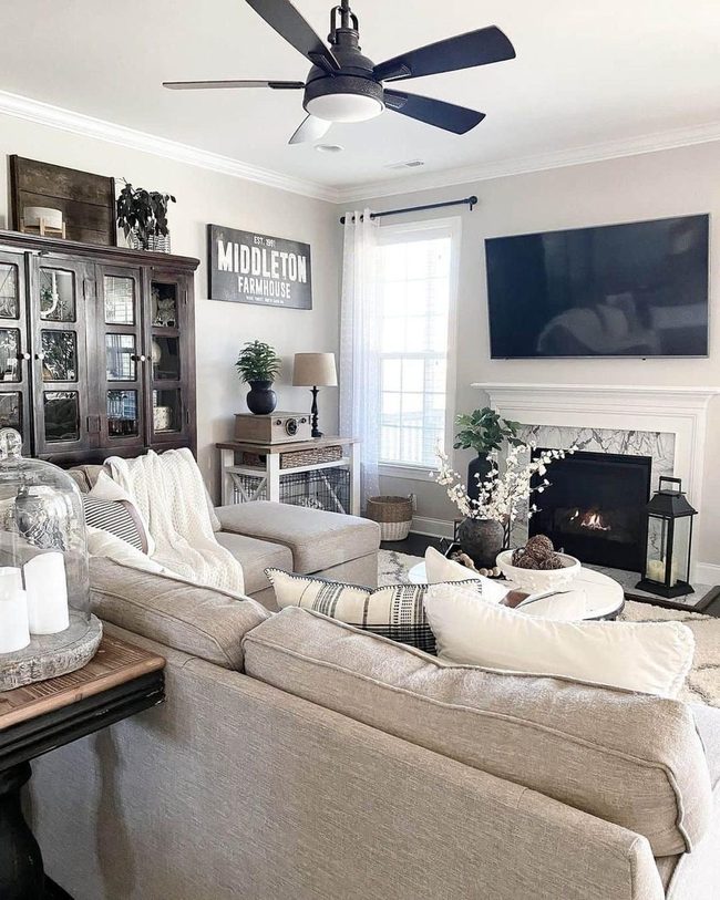 Beige Sectional Meets Marble Fireplace