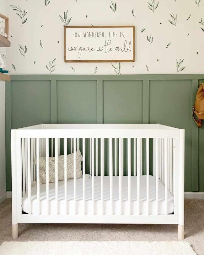 Green Paneling with White Crib Storage