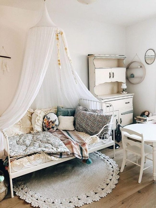 White Daybed With Layered Cushions