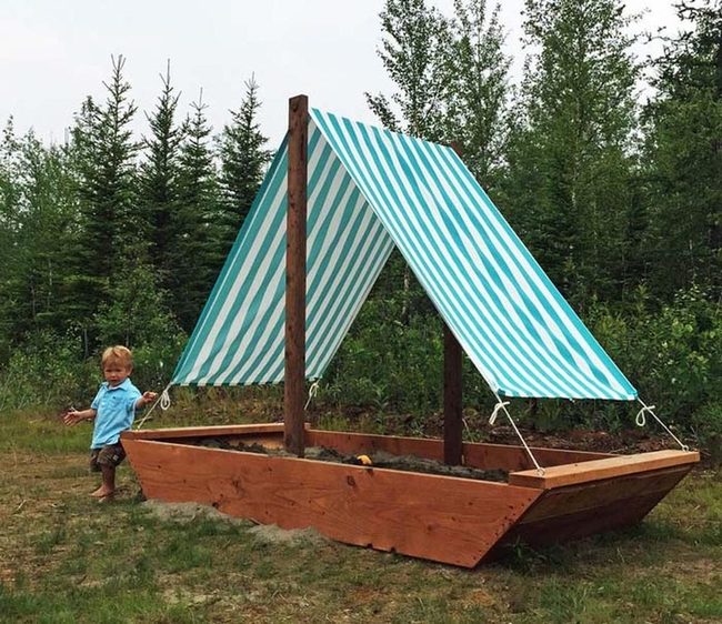 Boat-Shaped Sandbox With Fabric Sails