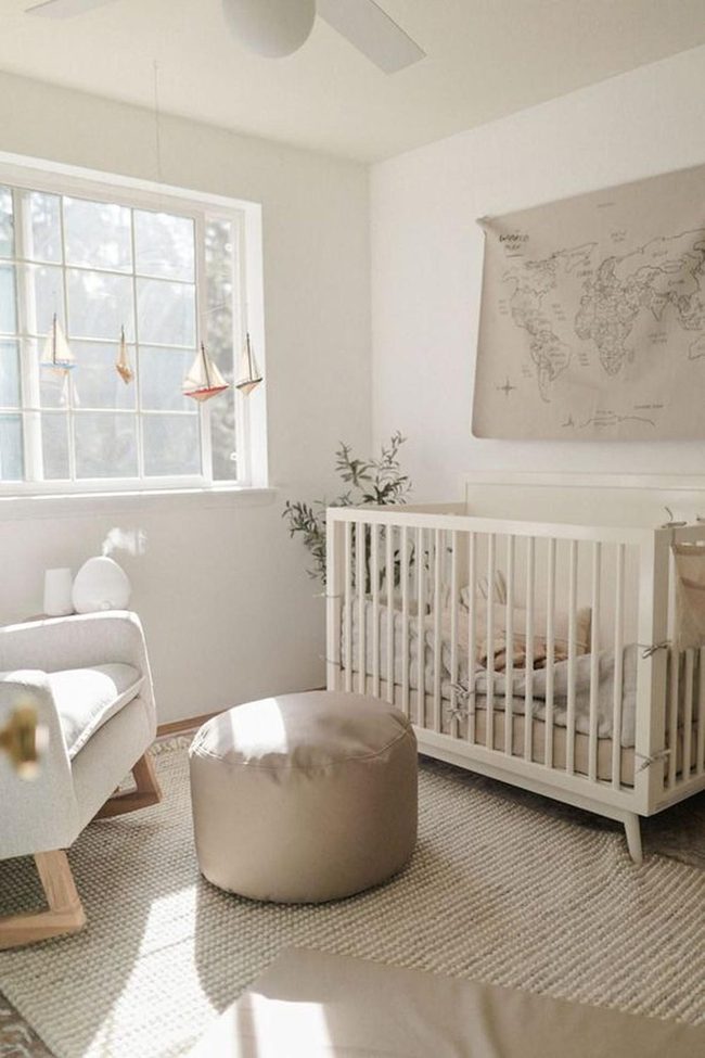 Sunlit Nursery With Sailboat Dreams