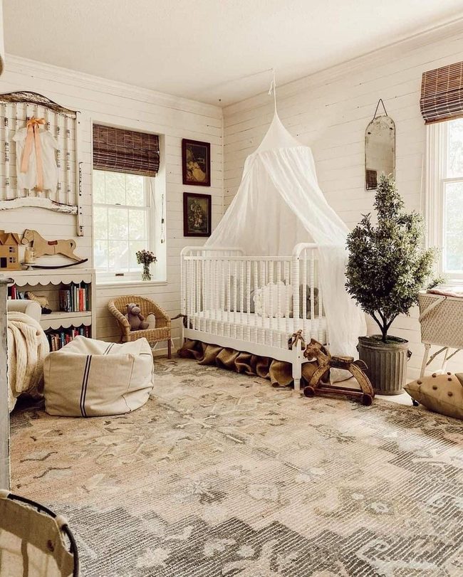 White Spindle Crib With Sheer Canopy