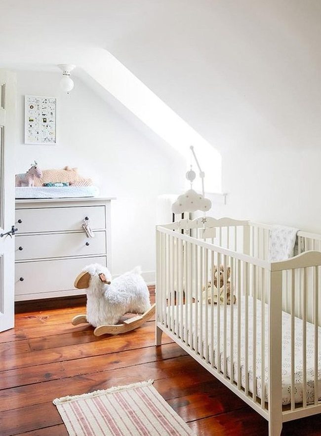 Sunlit Nursery With Wood Floors