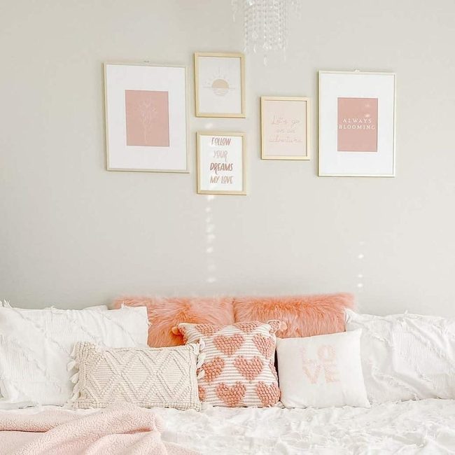 Gold Frames And Pink Bedroom
