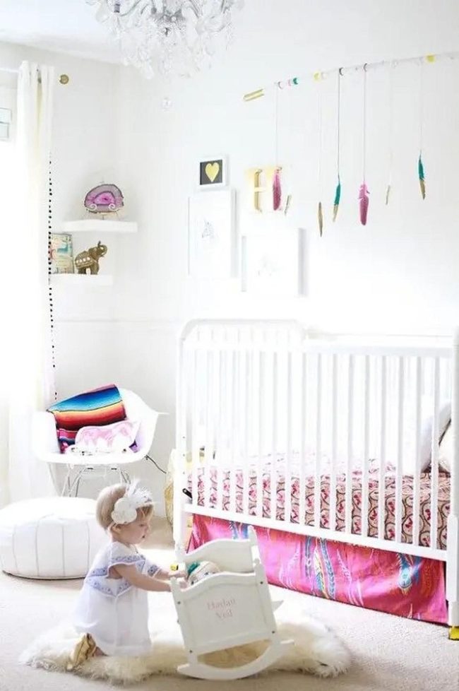 Pink Feathers Over White Crib