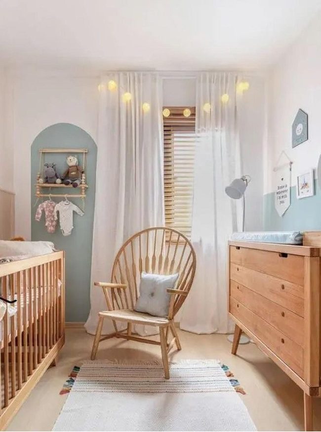 Pale Blue Nursery With Natural Wood