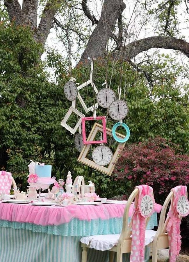 Pastel Clocks Over Tea Table