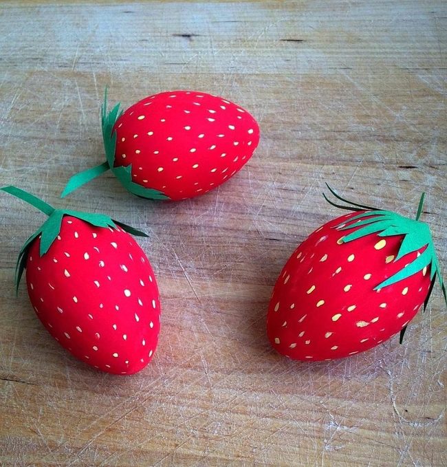 Red Paper Strawberries On Weathered Wood