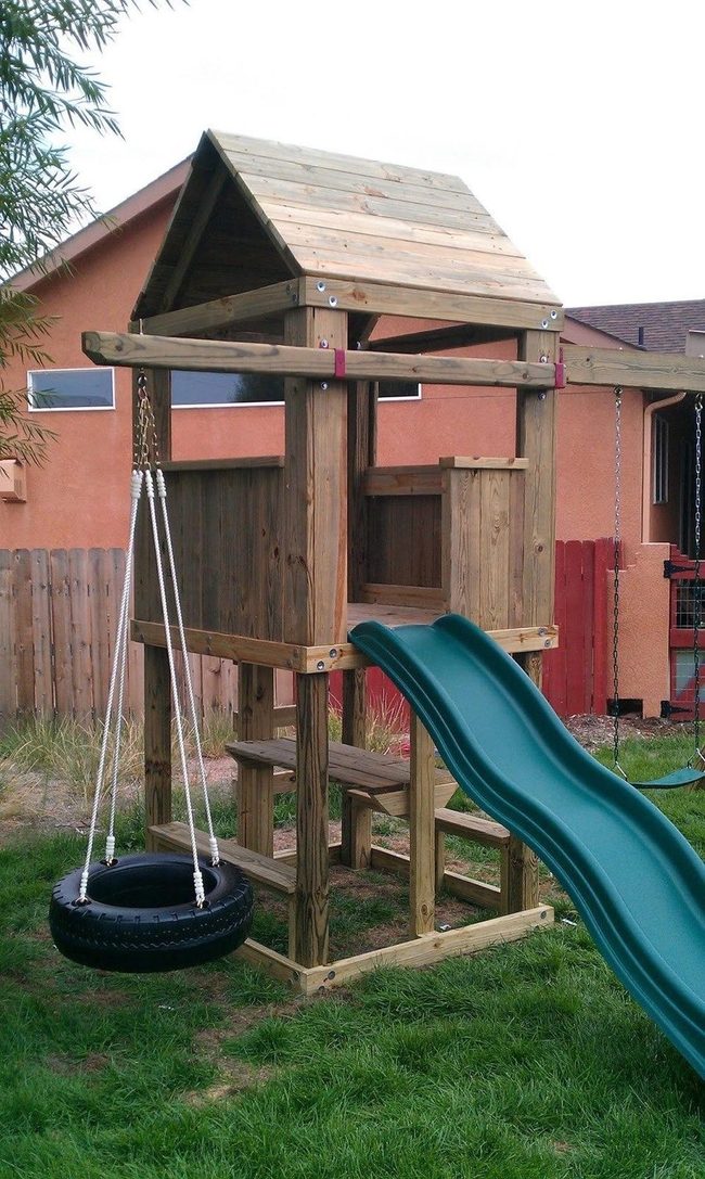 Wooden Playground Among Trees