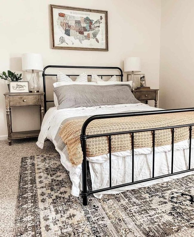 Black Metal Bed With Gray Bedding