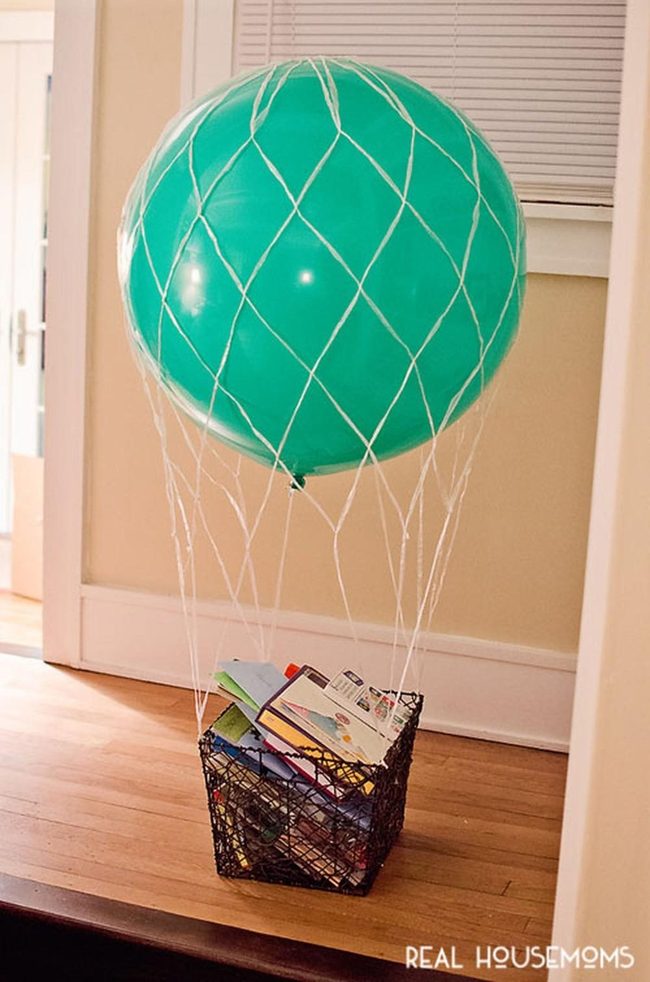 Green Balloons Float Above Baskets