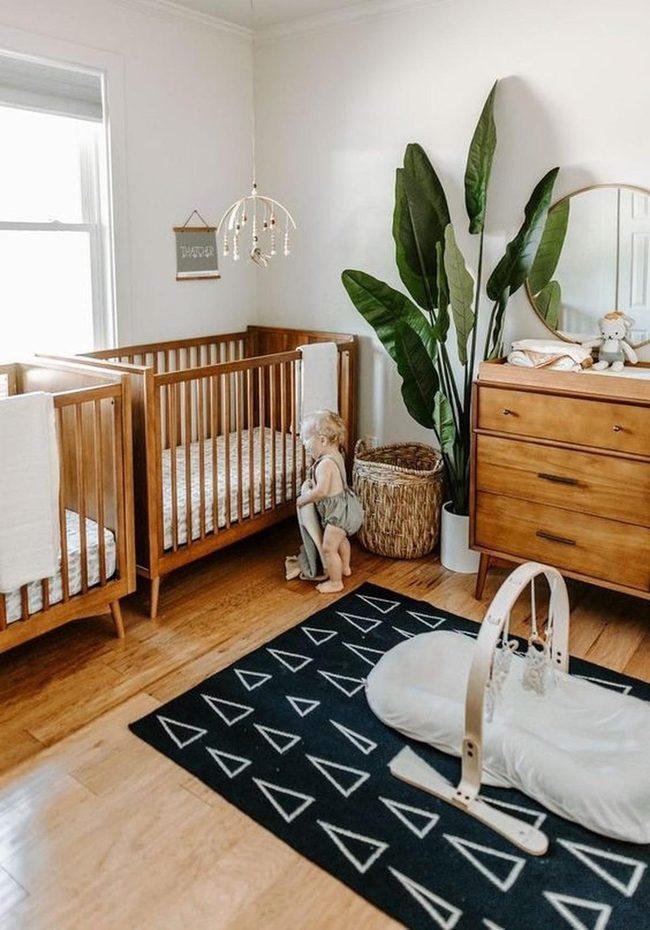 Twin Cribs With Geometric Rug