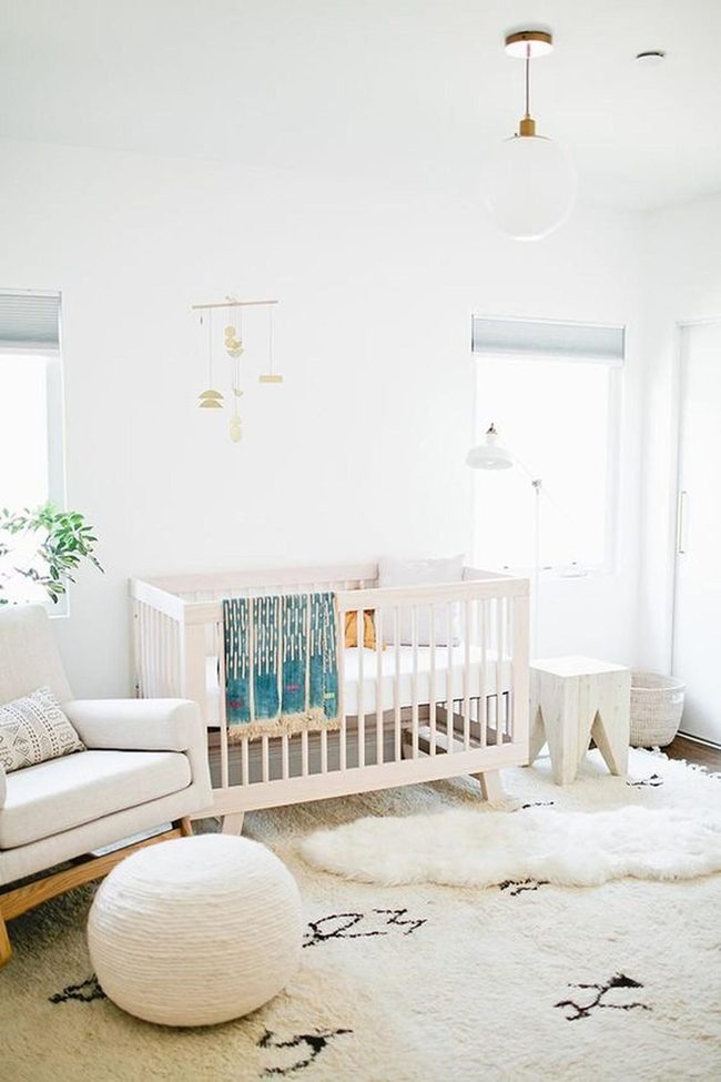 Sunlit Nursery With Teal Accents
