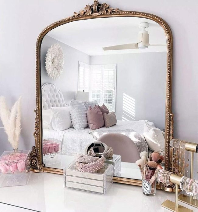 Gold Arch Expands White Bedroom