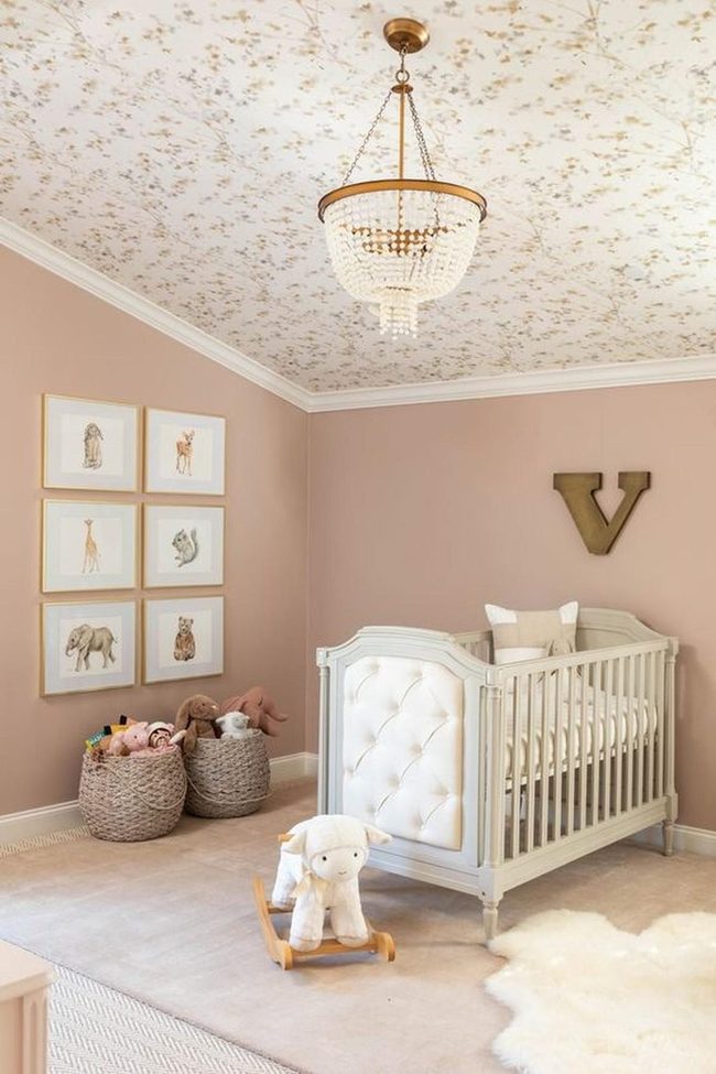 Pink Floral Nursery With Wooden Chandelier