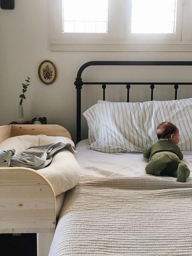 Sunlit Black Beds, White Linens