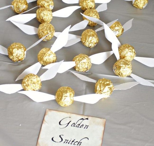 Golden Snitches With White Paper Wings
