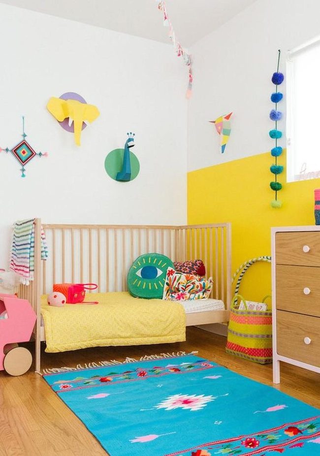 Yellow Walls, Wooden Crib, Colorful Pillows