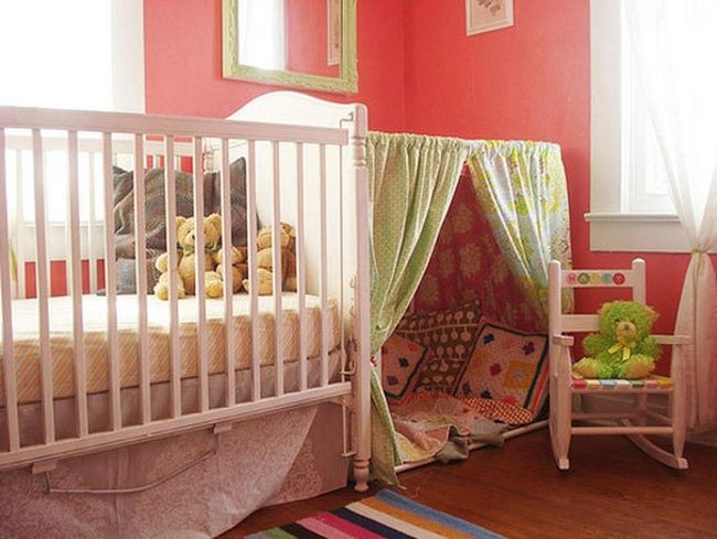 Coral Nursery With Playful Rainbow Floor