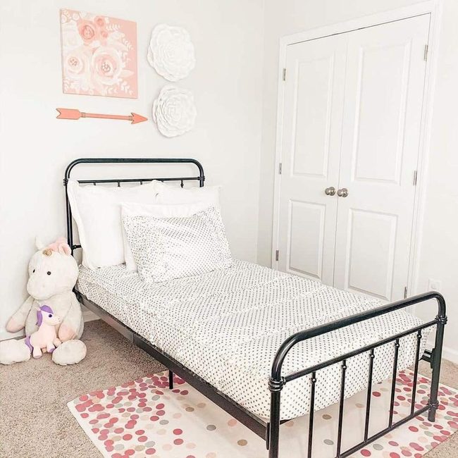 Black Iron Bed, Pink Rose Walls