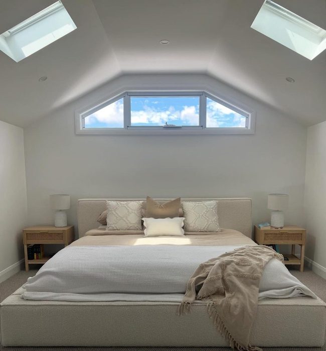 Cloud-Level Bedroom With Skylight Drama