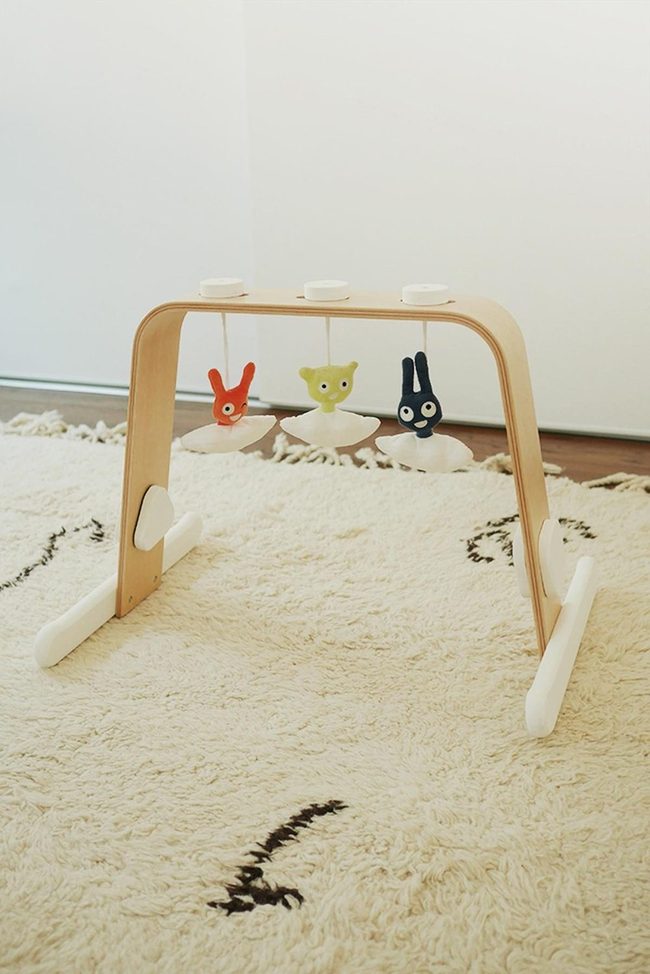 Sunlit Nursery With Hanging Toys