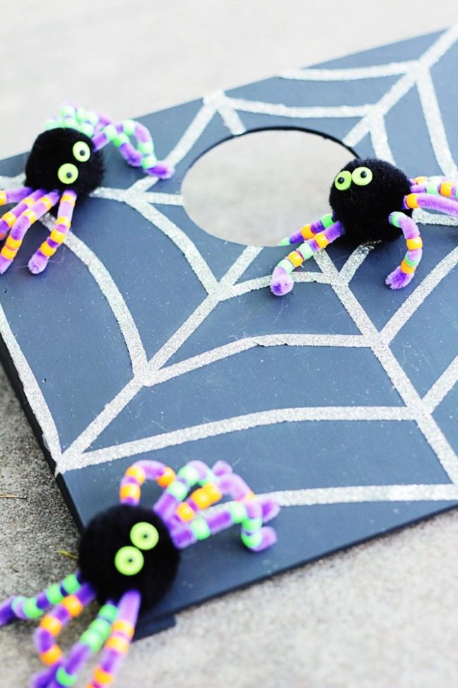 Neon-Eyed Spiders On Blue