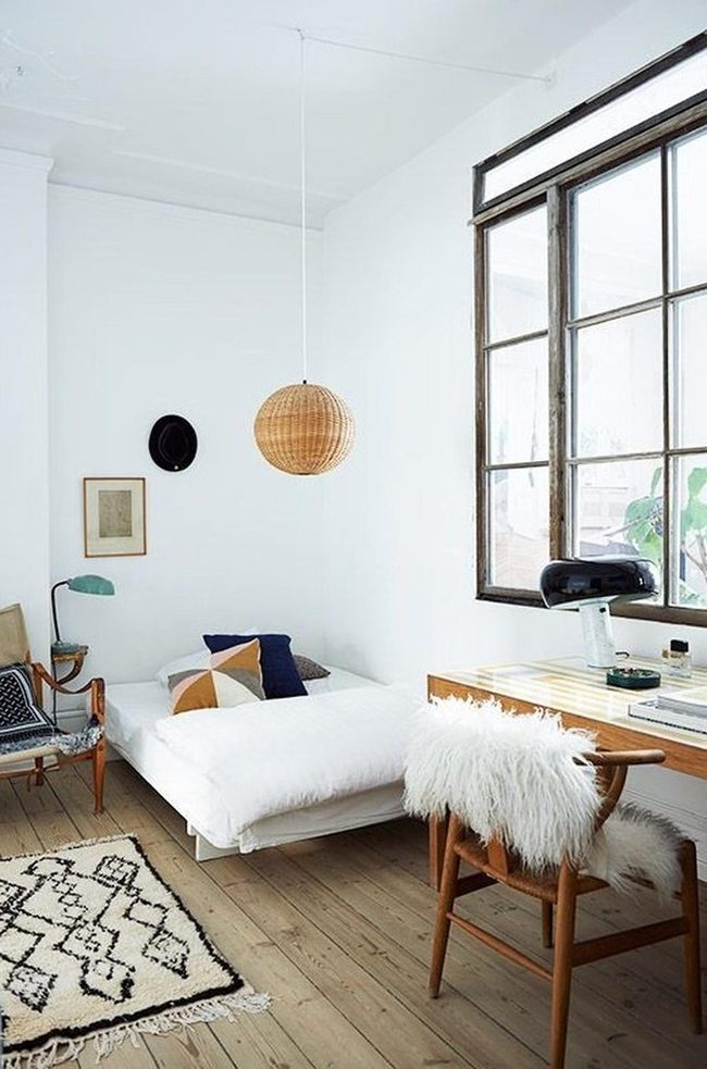 Geometric Pillows Brighten White Bedroom