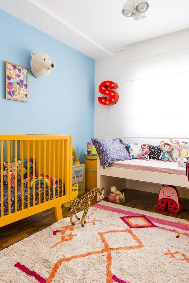 Yellow Crib, Blue Walls, Happy Kids Space