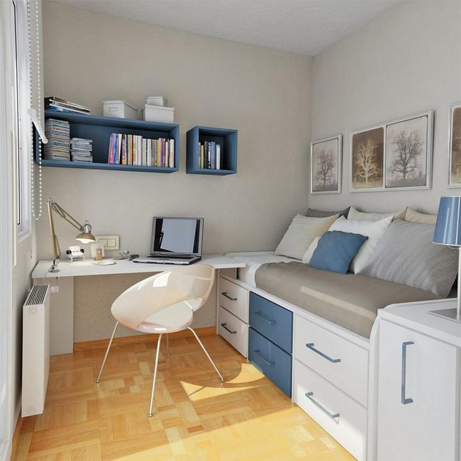 Blue Shelves Brighten Minimalist Workspace