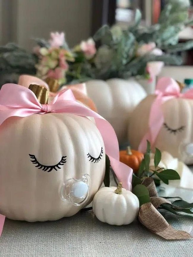 White Pumpkins With Painted Eyelashes